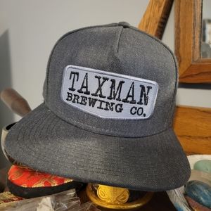 Taxman flat brim snap back hat